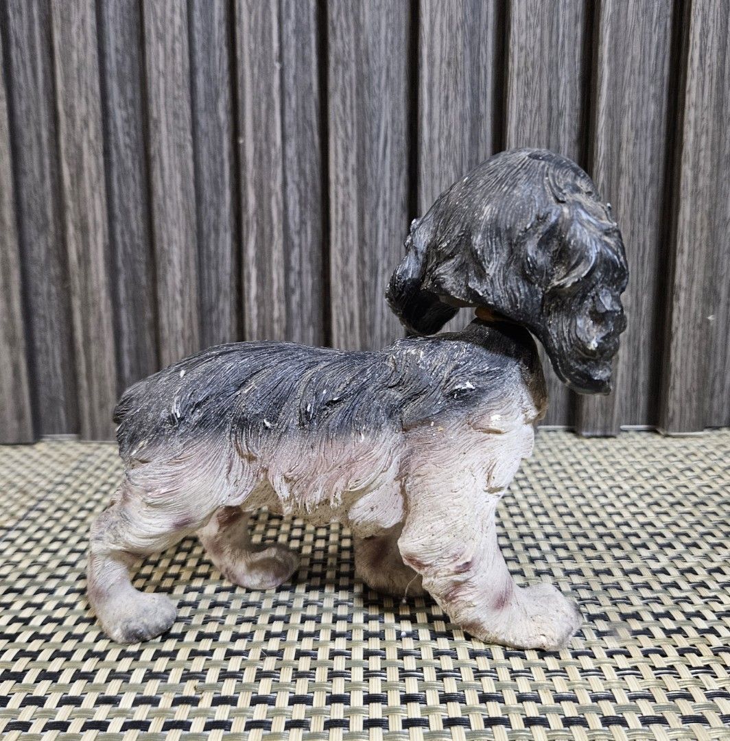 Cocker Spaniel Dog Bobble Head Figurine Statue (Category: Figurines & Statues) located in Rizal. Submitted by cherry_garcia (Listing ID 1445320990, Image 3). Description: - Adorable vintage dog figurine - Resembles a Cocker Spaniel - Black and white coloring with subtle pinkish tones on legs and chest - Features a unique textured finish - Ideal for dog figurine collectors or as a charming decorative piece - Stands approximately 4 inches tall.