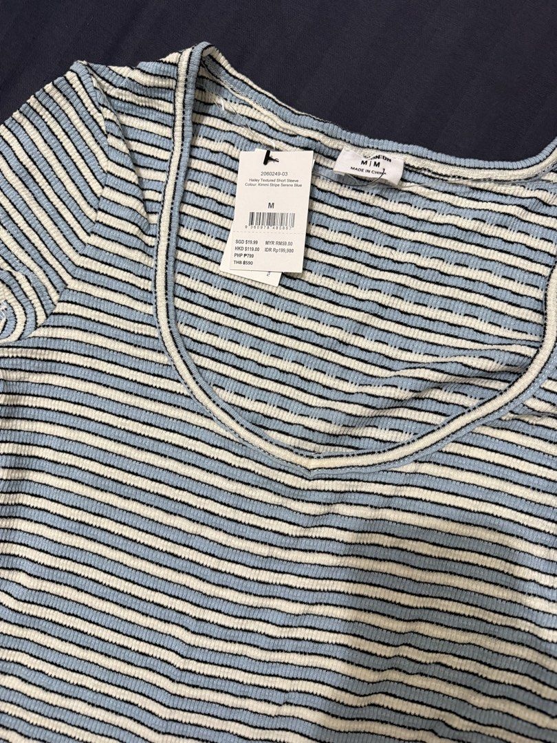 Cotton On Striped Ribbed Square Neck Top Size M (Category: Blouses) located in Orani. Submitted by keyychain (Listing ID 1445339077, Image 1). Description: - Brand: Cotton On - Color: Blue and white stripes - Material: Ribbed fabric - Neckline: Square - Sleeves: Short - Condition: Brand new with tag - Size: Medium (M).