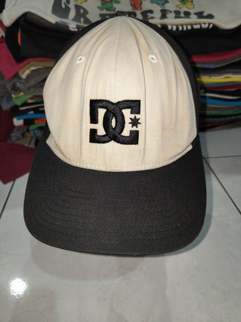DC Shoes Flexfit Cap (Category: Cap & Hats) located in Kuala Lumpur. Submitted by golyolistore (Listing ID 1445350419, Image 1). Description: - Brand: DC Shoes - Design: Two-tone (black brim, off-white crown) - Features: Embroidered DC logo on front - Technology: Flexfit for comfortable fit - Size: L-XL - Ideal for: Everyday wear - FREE SHIPPING Nationwide! .