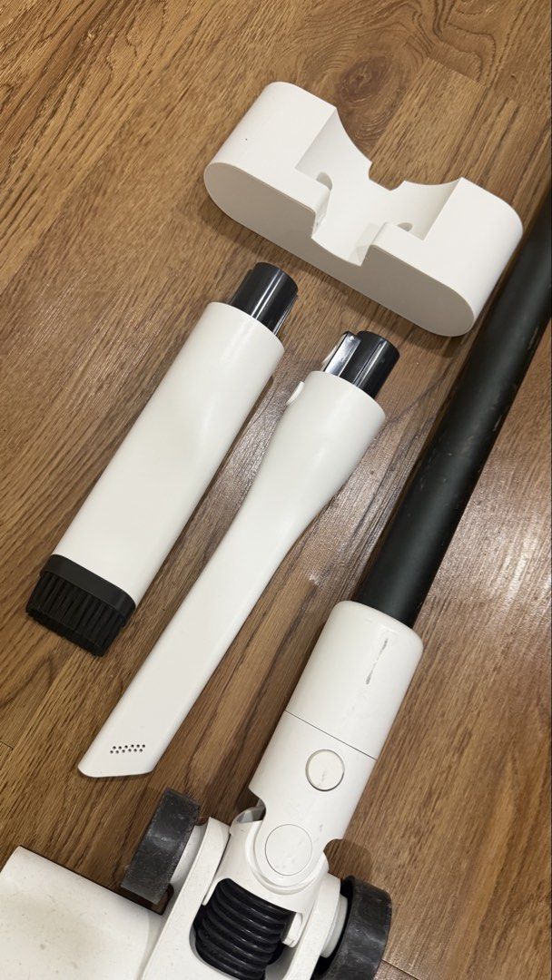 Deerma T10W Accessories (Category: Vacuum Cleaner & Housekeeping) located in Pasig City. Submitted by declutterpsg (Listing ID 1445296036, Image 2). Description: - Genuine Deerma T10W vacuum cleaner accessories - Includes wall mount, crevice tool, and brush nozzle - White color, sleek design - Perfect for replacing lost or broken parts or for expanding your vacuum's functionality.