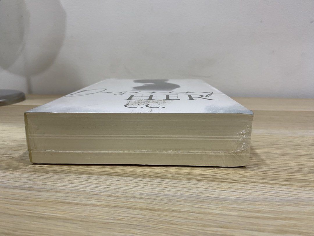 Desiring Her by Cecelib (Category: Storybooks) located in Caloocan City. Submitted by giaclutter (Listing ID 1445245321, Image 3). Description: - Desiring Her by C.C. - Brand new, still sealed MOP: Gcash MOD: Lalamove RFS: Need to declutter and need funds 📌 If you have any questions or need detailed pictures, kindly message me 🙂 .