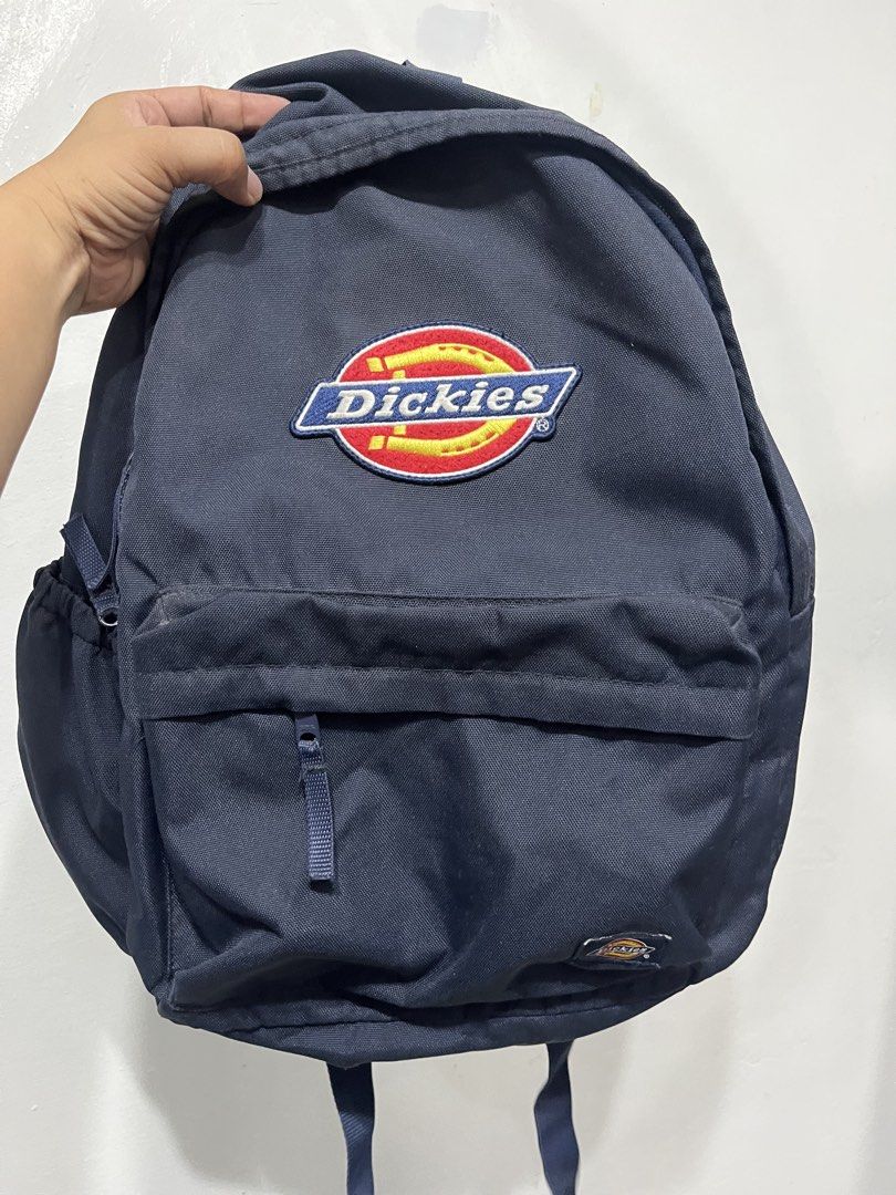 Dickies Navy Blue Backpack (Category: Backpacks) located in Muntinlupa City. Submitted by youngstone.48f306 (Listing ID 1445357414, Image 1). Description: - Classic navy blue Dickies backpack - Iconic Dickies logo patch on front - Main compartment for storage - Front pocket for easy access - Side pockets for water bottles or small items - Adjustable straps for comfortable wear - Ideal for school, work, or everyday adventures.