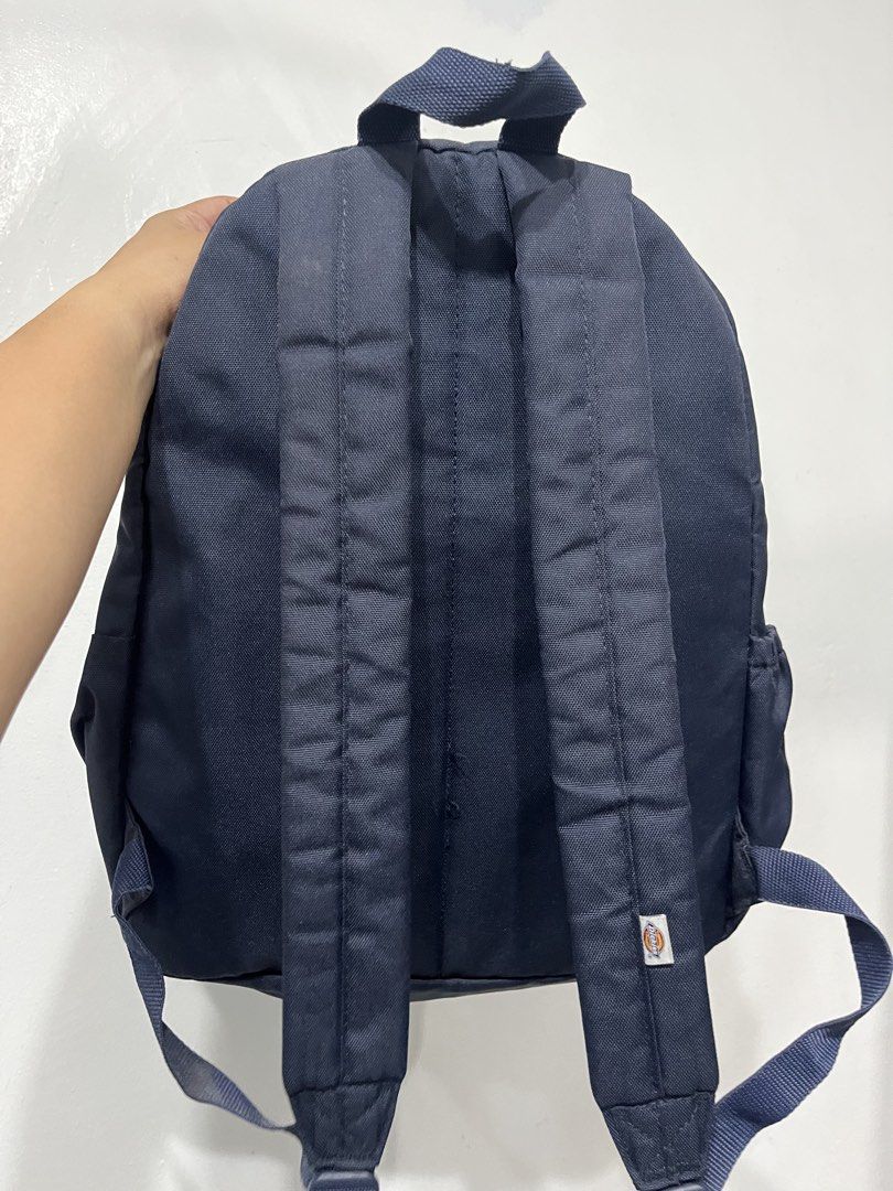 Dickies Navy Blue Backpack (Category: Backpacks) located in Muntinlupa City. Submitted by youngstone.48f306 (Listing ID 1445357414, Image 2). Description: - Classic navy blue Dickies backpack - Iconic Dickies logo patch on front - Main compartment for storage - Front pocket for easy access - Side pockets for water bottles or small items - Adjustable straps for comfortable wear - Ideal for school, work, or everyday adventures.