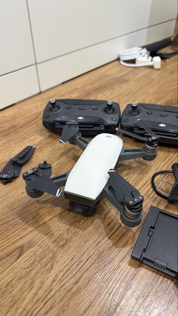 DJI Spark Drone with Controllers, Batteries, Charger, and Case (Category: Drones) located in Pasig City. Submitted by declutterpsg (Listing ID 1445241493, Image 2). Description: - DJI Spark Drone - Includes 2 Controllers - Includes 3 Batteries - Charging Hub - Power Adapter - Carrying Case - Spare Propellers - Ready for Flight RFS: Decluttering.