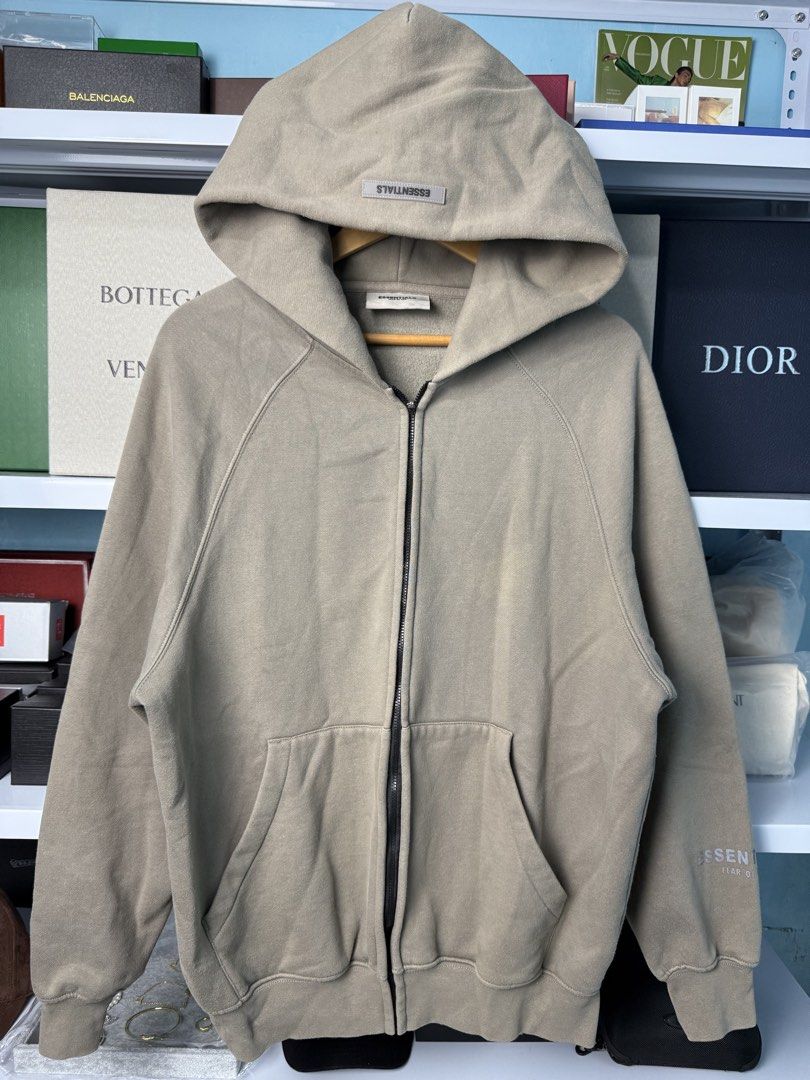 ESSENTIALS (Category: Coats, Jackets and Outerwear) located in Quezon City. Submitted by generalmerchandiseph (Listing ID 1445416479, Image 3). Description: - ESSENTIALS FEAR OF GOD - ZIP UP HOODIE BEIGE COLORWAY - 3D EMBOSSED BACK LOGO - REFLECTORIZED SLEEVES LOGO - GUARANTEED AUTHENTIC - EXCELLENT CONDITION - SIGN OF USAGE ONLY - WASHED AND READY TO WEAR 🫧.