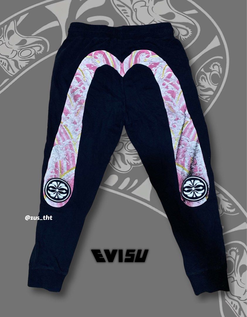 EVISU Custom Made Sweatpants (Category: Joggers) located in Makati City. Submitted by zus_tht (Listing ID 1445400773, Image 1). Description: - Complete Tags - Color: Black - Features: Iconic Evisu logo graphic on legs, drawstring waist for comfortable fit - Style: Great for casual wear - Size: Small (S) on Tag - Condition: Please check photos for detailed condition. Need wash.