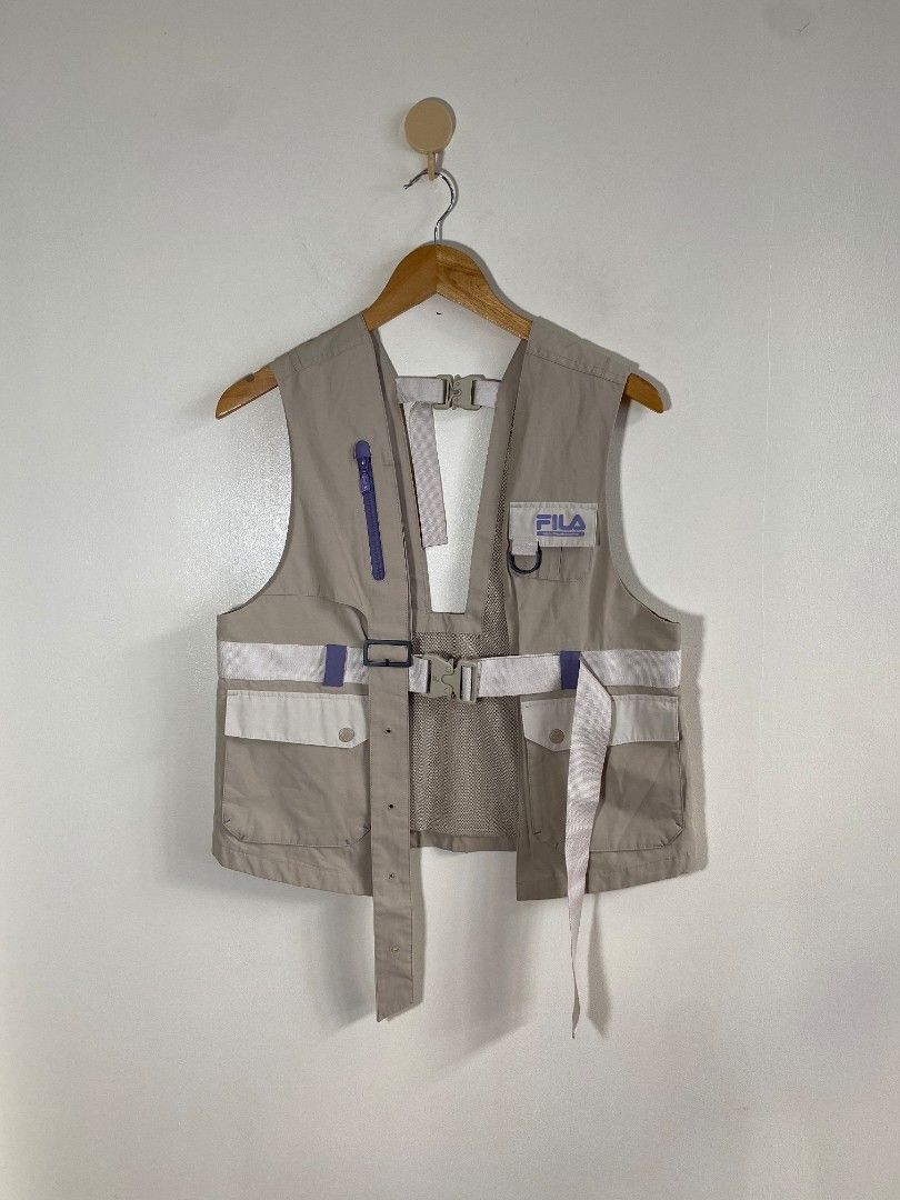 Fila x White Mountaineering Utility Vest (Category: Vests) located in Abucay. Submitted by jamesnike21 (Listing ID 1445414600, Image 1). Description: 📌White Mountaineering x Fila Multipocket Vest 📌like new condition 📌size small on tag 📌width 19 1/2' 📌length 22' 📌Slightly wrinkled due to storage 👍 📌The color of the product may differ from actual color depending on the type, condition of the display, surrounding light and other factors. 👍 