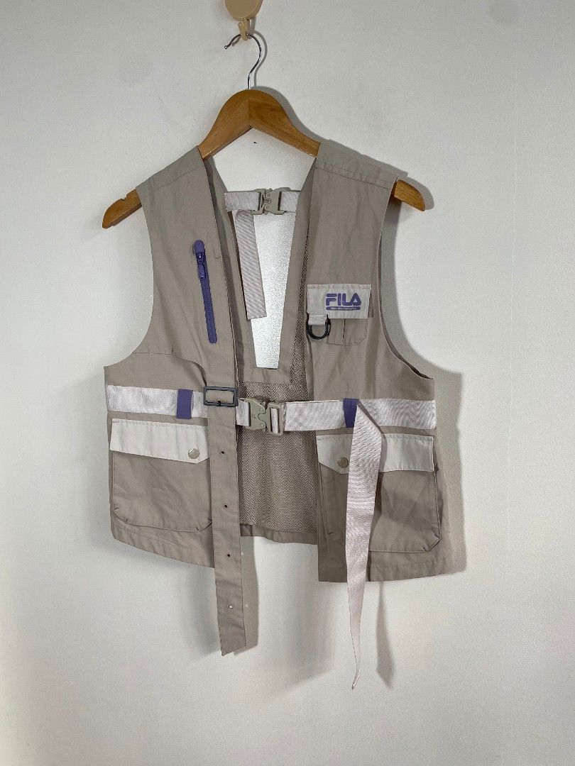 Fila x White Mountaineering Utility Vest (Category: Vests) located in Abucay. Submitted by jamesnike21 (Listing ID 1445414600, Image 2). Description: 📌White Mountaineering x Fila Multipocket Vest 📌like new condition 📌size small on tag 📌width 19 1/2' 📌length 22' 📌Slightly wrinkled due to storage 👍 📌The color of the product may differ from actual color depending on the type, condition of the display, surrounding light and other factors. 👍 