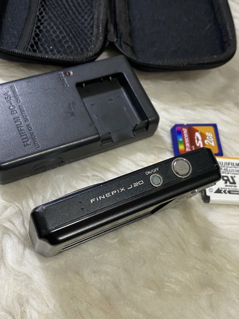 Fujifilm finepix j20 digicam (Category: Cameras) located in Cavite. Submitted by she.zie77e (Listing ID 1445289583, Image 2). Description: • fujifilm finepix j20 inclus: battery, batt charger, sd card, strap, and case — honest issue in the photo: lcd lines and zoom error (repairable) No sample shots, hindi ko na mahanap>< Php 2,800.