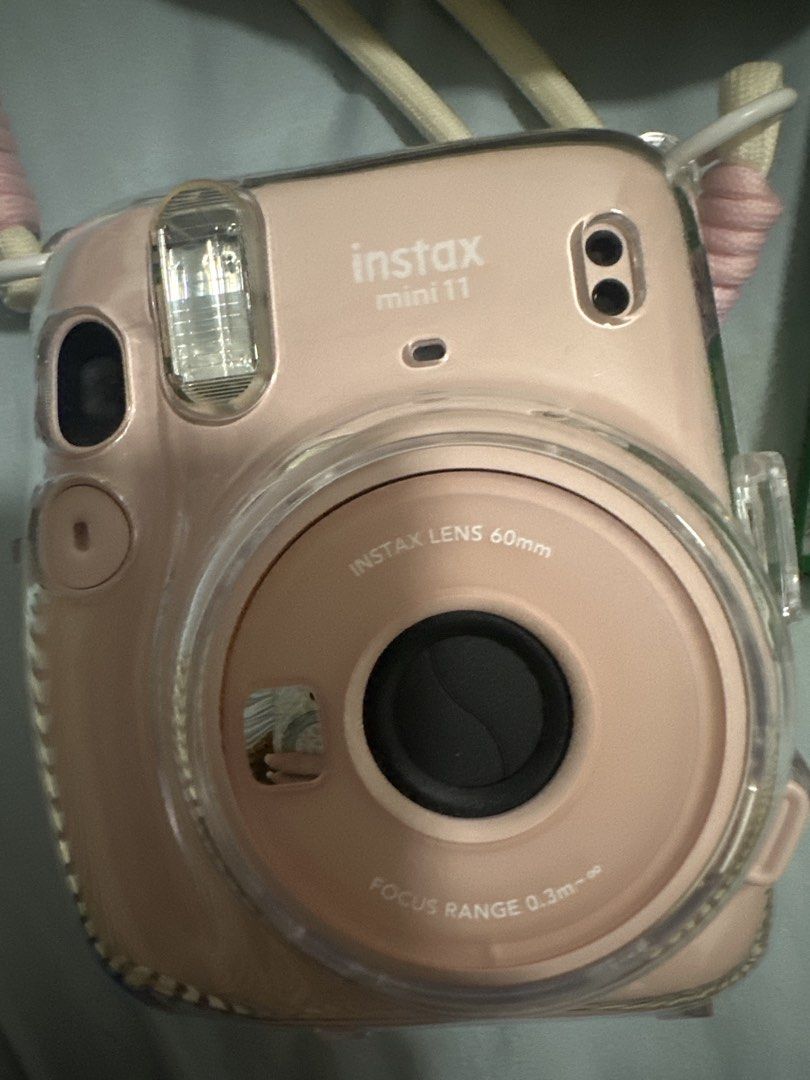 Fujifilm Instax Mini 11 Pink Camera with Case & Film (Category: Cameras) located in Kuala Lumpur. Submitted by selinatsyin (Listing ID 1445367821, Image 2). Description: - Pink Fujifilm Instax Mini 11 camera - Comes with a cute plush camera bag - Includes two packs of Instax Mini film - Camera has a clear protective case - Ideal for capturing memories on the go - Ready for your next adventure!.