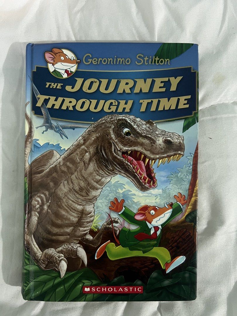 Geronimo Stilton The Journey Through Time Scholastic Book (Category: Children's Books) located in Quezon City. Submitted by amarakisells (Listing ID 1445322206, Image 1). Description: - Geronimo Stilton book: 'The Journey Through Time' - Publisher: Scholastic - Features: Fun illustrations and an exciting time travel adventure - Ideal for: Young readers who love adventure and history - Condition: Pages are clean and intact. Minor wear on the insid