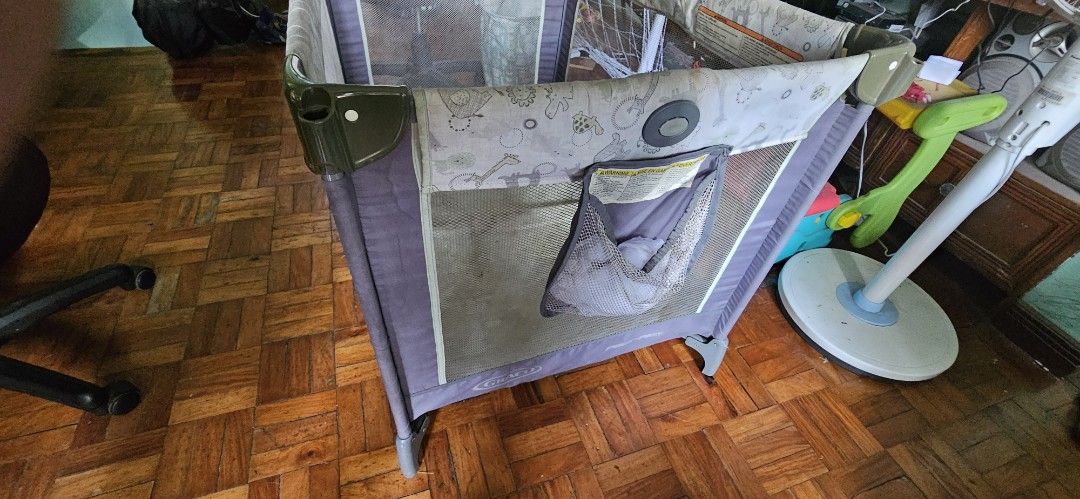 Graco Pack 'n Play Playard (Category: Cots & Cribs) located in Pasig City. Submitted by prettypr1ncess (Listing ID 1445311398, Image 2). Description: Graco playpen Location. Pasig manggahan Can do meet up by schedule in nearby areas Comes with carry case and diaper changing station notninckuded in oicture because utnisbin storage right now Needs cleaning - Portable playard perfect for babies - Mesh sides ensure good ventilation - Comes with a com