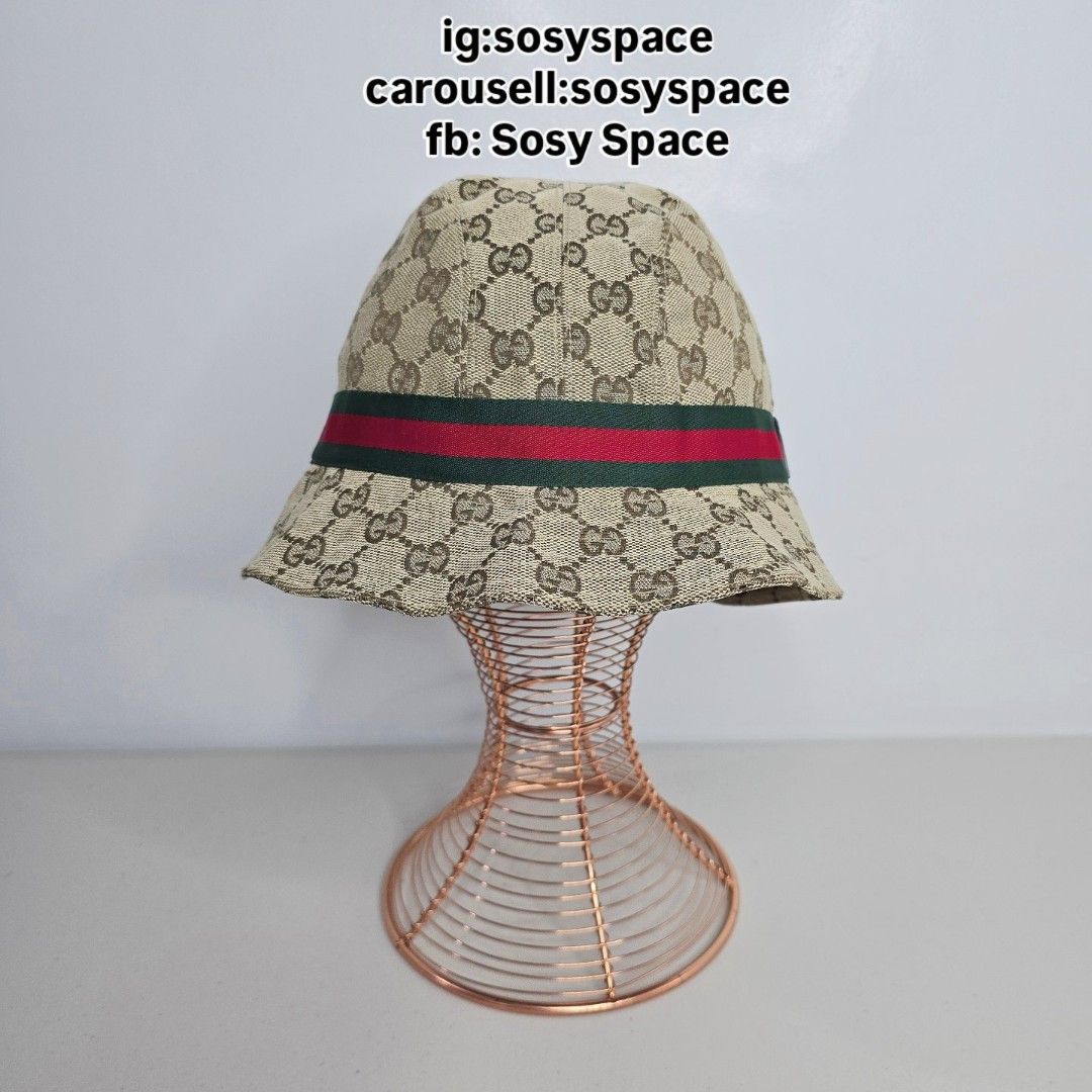 GUCCI GG Monogram Bucket Hat (Category: Luxury Accessories) located in Lucena. Submitted by sosyspace (Listing ID 1445247989, Image 2). Description: G. U. C. C. I. 11B1P187 Brown/ Beige GG Monogram Canvas Bucket Hat Red & Green Web Sherry Line Web Stripe italy size: XL 24x24cm Condition: PRELOVED Excellent condition. Price: Php 18,000 + HF + SF (Best Price Already. No More Haggling Please!😘) ------- Most of my items has published videos at my i 