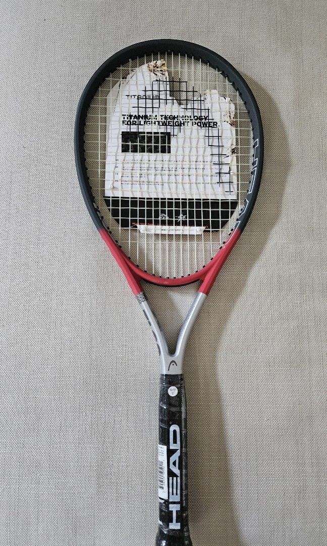 Head Ti S2 (Strung) Tennis Racket (Category: Racket and Ball Sports) located in Quezon City. Submitted by beabaron (Listing ID 1445370383, Image 2). Description: Brand New, Never Used "The lightweight all-around racket" > Titanium fabric provides stability and control > Grip Size: 3 or 4 3/8 > Weight: 245g > Head size: 102 sq. in > Color: black and red > Balance: 360mm.
