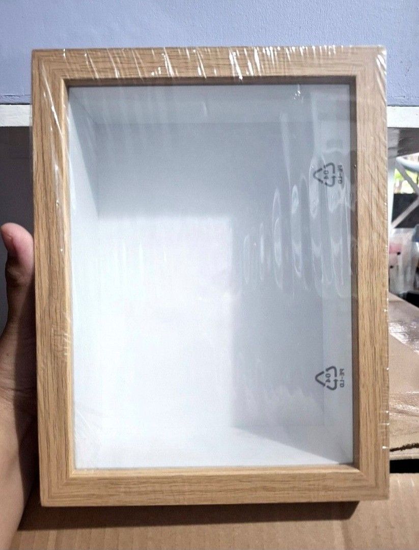 Hollow box 8-Inch Shadow Box Display (Category: Frames & Pictures) located in Quezon City. Submitted by an.marie (Listing ID 1445330829, Image 1). Description: - Original wood finish photo frame - Can be used as a shadow box for keepsakes - Size: 8 inches - Includes stand for tabletop display - Protective plastic film still on glass - Ideal for DIY projects or gifting.