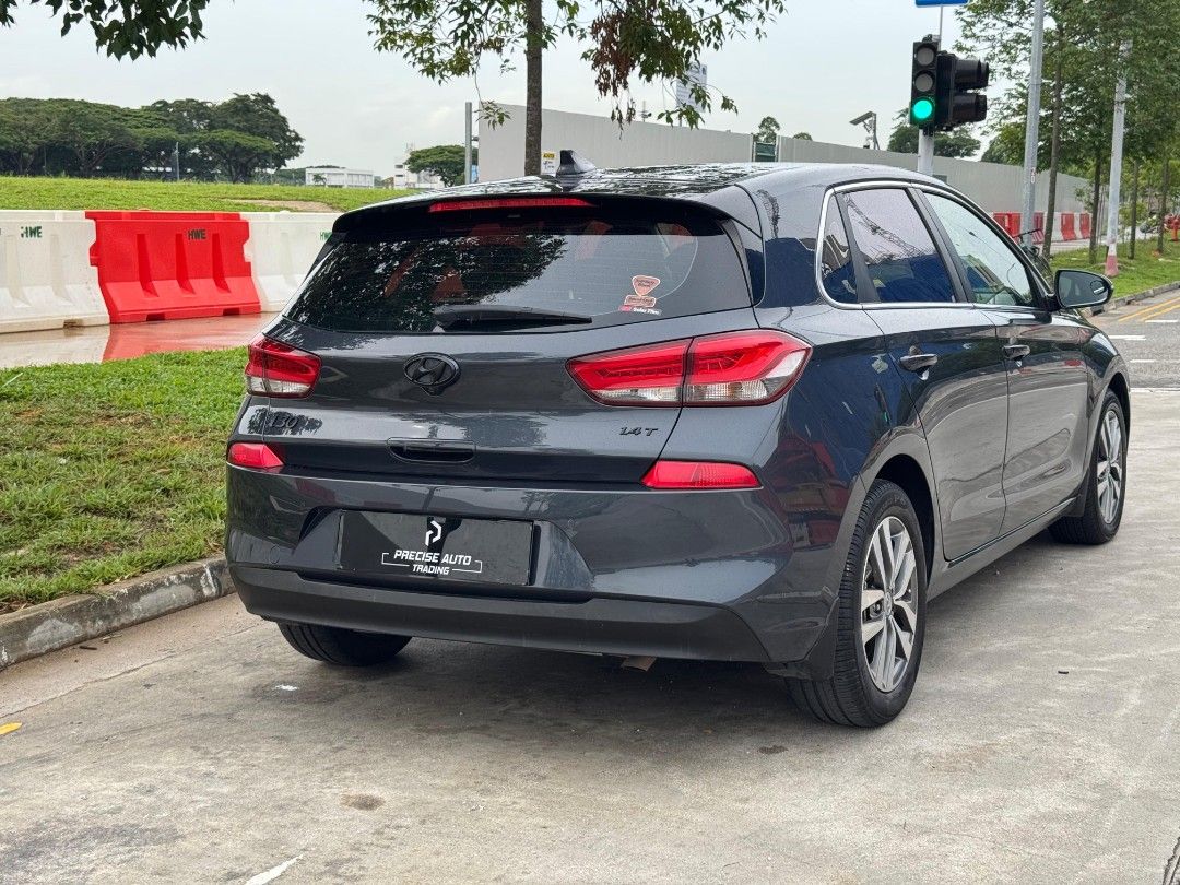 Hyundai i30 1.4A T-GDi DCT Turbo Auto (Category: Used Cars) located in Singapore. Submitted by preciseauto (Listing ID 1445395970, Image 3). Description: 🔥🔥BOSS SAY ALL MUST GO CLEARANCE SALE🔥🔥 🚨CHEAPEST CARS IN THE MARKET🚨 🚘$500 DRIVEAWAY🚘 🏦LOWEST INTEREST FROM 1.48%🏦 🟢1 YEAR WARRANTY🟢 🔧FREE 1 YEAR SERVICING🔧 🏬 Vehicle 120 Points INSPECTION CHECK By In House Workshop BEFORE we put them for SALE 🚕 PHV Drivers Welcomed 🔁 High Trad