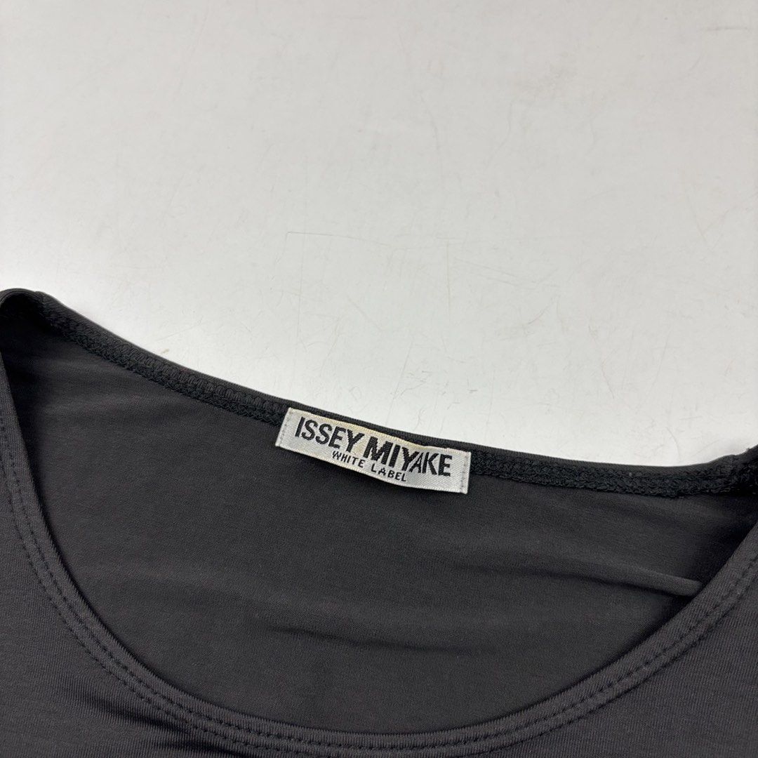 Issey Miyake White Label Shirt (Category: Shirts) located in Makati City. Submitted by ragrepository (Listing ID 1445366718, Image 2). Description: Issey Miyake White Label Shirt Tagged as 2 (stretchable) Length- 21” Pit to pit-17” Sleeves-7.5” Shoulder- 15” Condition-9.5/10 Flaw-None.
