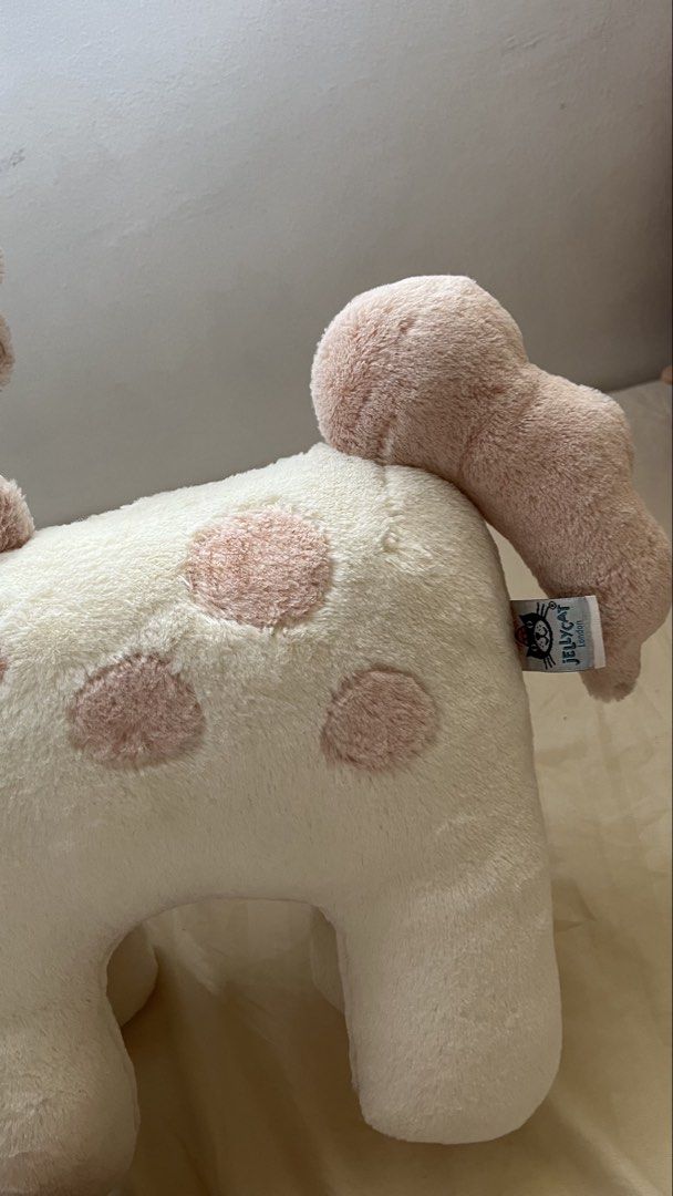 Jellycat large Unicorn Plush Toy (Category: Plushies & Soft Toys) located in Quezon City. Submitted by jellycooties (Listing ID 1445271379, Image 3). Description: - Adorable Jellycat Bartholomew Bear Unicorn plush - Super soft and cuddly material - White with charming pink spots - Features a lovely pink mane and tail - Approximately 12 inches tall - Ideal for nursery decor or as a special gift.