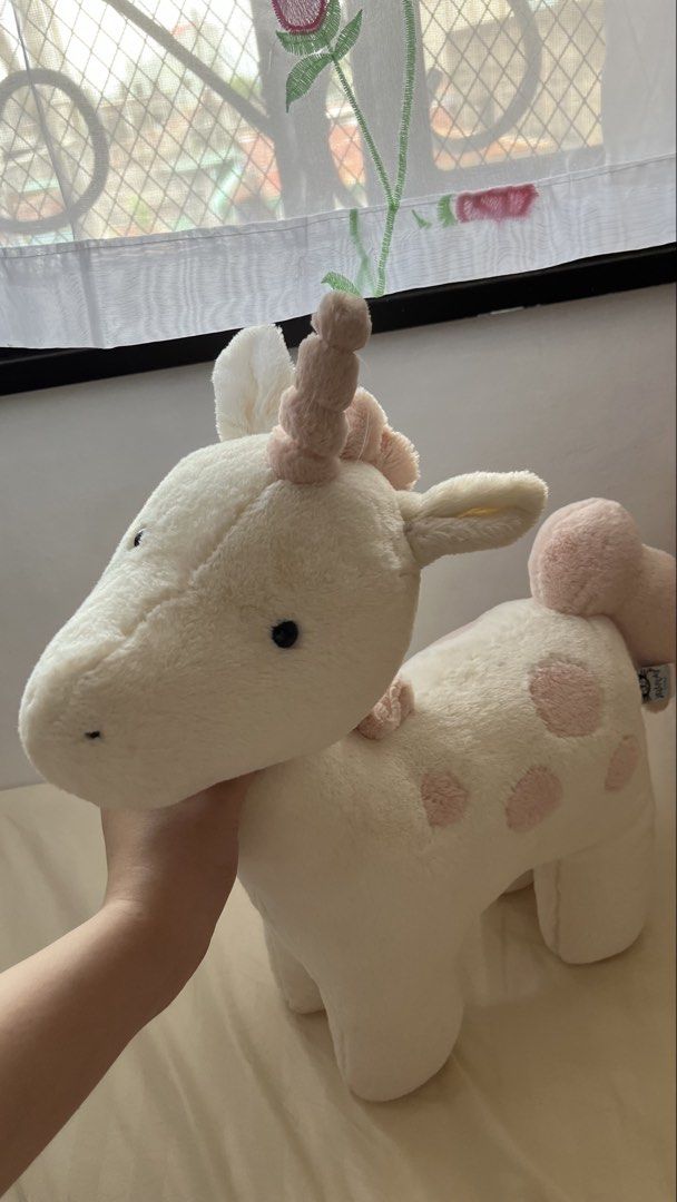 Jellycat large Unicorn Plush Toy (Category: Plushies & Soft Toys) located in Quezon City. Submitted by jellycooties (Listing ID 1445271379, Image 2). Description: - Adorable Jellycat Bartholomew Bear Unicorn plush - Super soft and cuddly material - White with charming pink spots - Features a lovely pink mane and tail - Approximately 12 inches tall - Ideal for nursery decor or as a special gift.