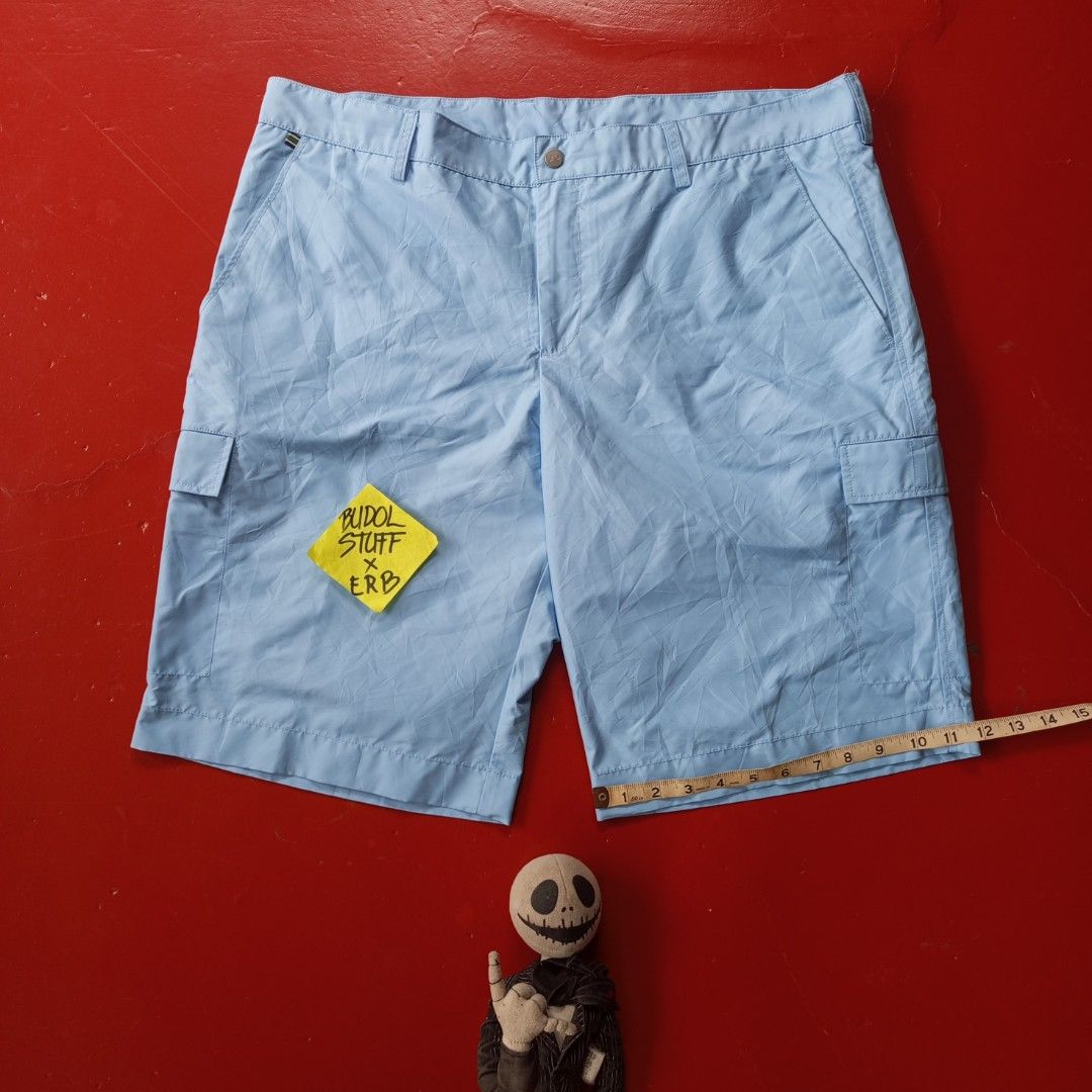 j.lindeberg Light Blue Cargo Golf Shorts (Category: Shorts) located in Naga. Submitted by ErbsXBudolstuff (Listing ID 1445382610, Image 2). Description: - Light blue J.Lindeberg cargo shorts Regular fit - Features pockets on front, back, and sides - Secure button and zip closure - Ideal for golf or casual wear Size 38 36to 40 fit Length 22 inc 6 Pockets Button Zipper Working.