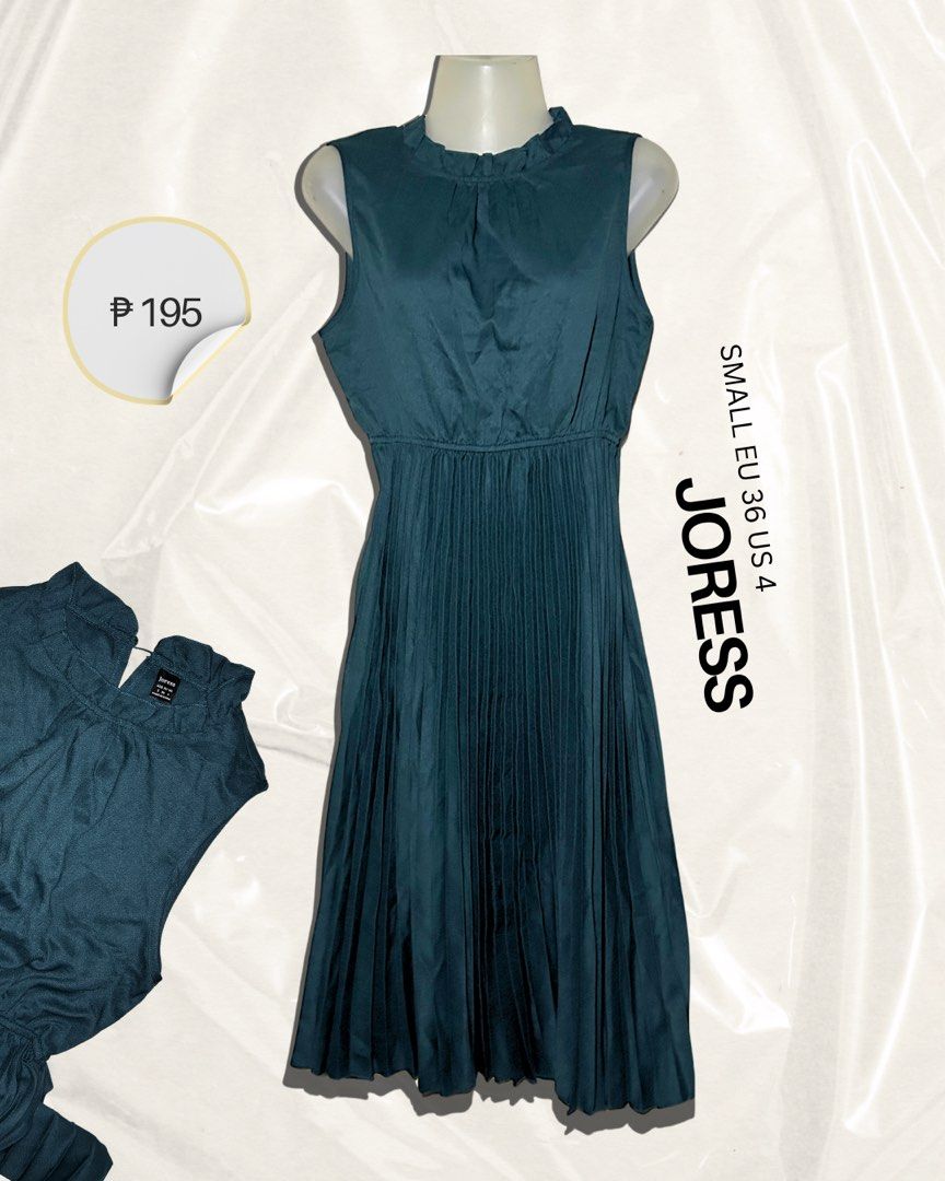 JORESS Teal Pleated Midi Dress (Category: Dresses) located in Pasig City. Submitted by nefertarii (Listing ID 1440897066, Image 1). Description: - Teal midi dress by JORESS - Sleeveless with a high neckline - Pleated skirt for a flattering silhouette - Elasticated waist for ultimate comfort - Estimated size: Small (EU 36, US 4) - Perfect for both casual and dressy occasions.