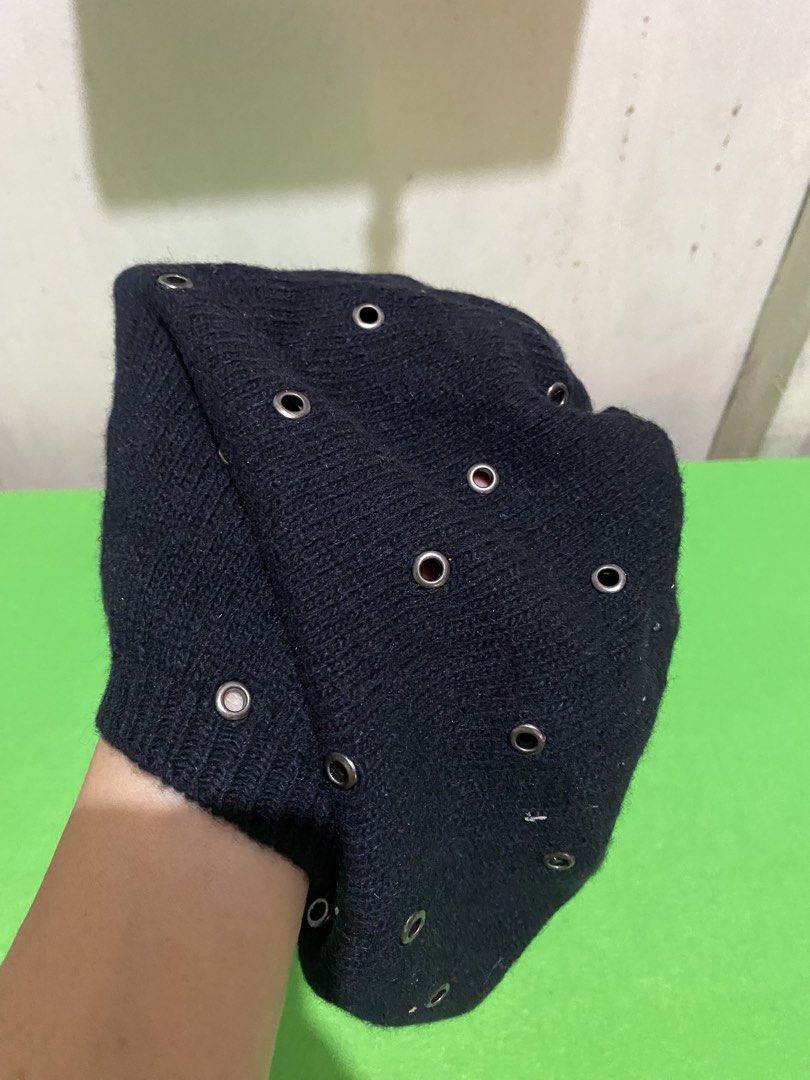 Kenneth Cole New York Black Beanie with Eyelets (Category: Caps & Hats) located in Manila. Submitted by resi.diaz (Listing ID 1445303814, Image 3). Description: - Brand: Kenneth Cole New York - Color: Black - Material: Knit - Features: All-over silver-tone eyelets - Style: Edgy, cool accessory - Season: Great for cooler weather - Sizing: One size fits most.