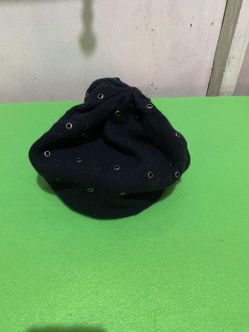 Kenneth Cole New York Black Beanie with Eyelets (Category: Caps & Hats) located in Manila. Submitted by resi.diaz (Listing ID 1445303814, Image 1). Description: - Brand: Kenneth Cole New York - Color: Black - Material: Knit - Features: All-over silver-tone eyelets - Style: Edgy, cool accessory - Season: Great for cooler weather - Sizing: One size fits most.