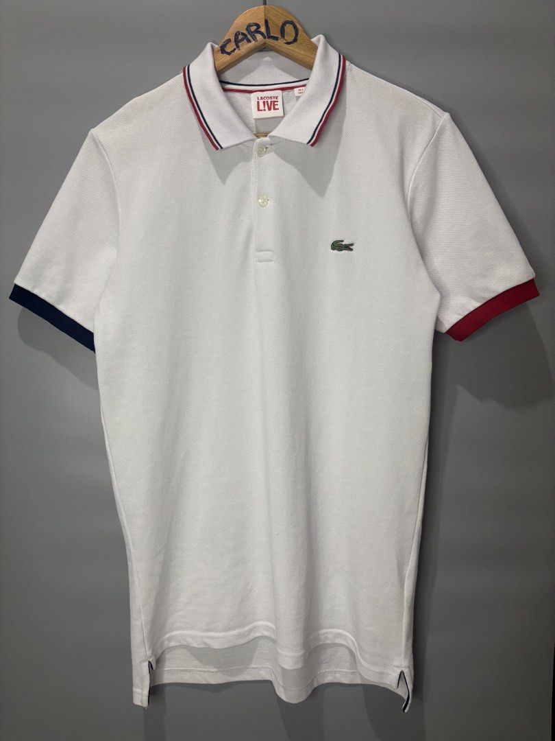 LACOSTE LIVE WHITE POLO SHIRT (Category: Tshirts & Polo Shirts ) located in Bayambang. Submitted by lo_keythrifting (Listing ID 1445398458, Image 1). Description: - White Lacoste Live Polo Shirt - Condition:Brand new condition - Dimes: 19*28-29 - Color rate: 10/10 - No issue - Size: US M / FR 4 - Features red and blue trim on collar and sleeves - Small green crocodile logo embroidered on chest - Ideal for casual wear MOP - GCASH COURIER - J&T.