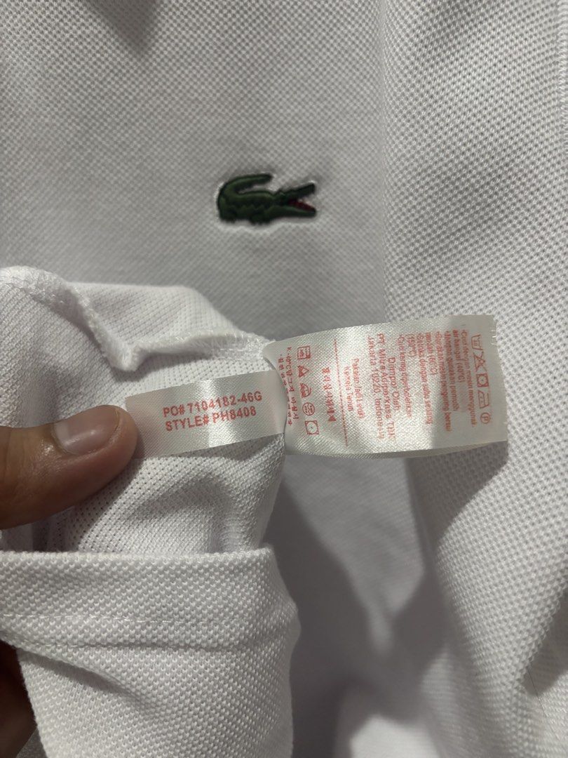 LACOSTE LIVE WHITE POLO SHIRT (Category: Tshirts & Polo Shirts ) located in Bayambang. Submitted by lo_keythrifting (Listing ID 1445398458, Image 3). Description: - White Lacoste Live Polo Shirt - Condition:Brand new condition - Dimes: 19*28-29 - Color rate: 10/10 - No issue - Size: US M / FR 4 - Features red and blue trim on collar and sleeves - Small green crocodile logo embroidered on chest - Ideal for casual wear MOP - GCASH COURIER - J&T.