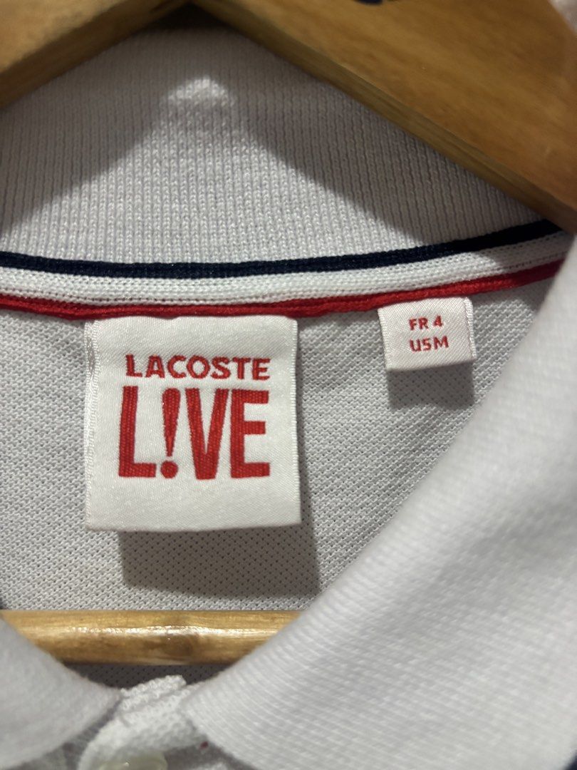 LACOSTE LIVE WHITE POLO SHIRT (Category: Tshirts & Polo Shirts ) located in Bayambang. Submitted by lo_keythrifting (Listing ID 1445398458, Image 2). Description: - White Lacoste Live Polo Shirt - Condition:Brand new condition - Dimes: 19*28-29 - Color rate: 10/10 - No issue - Size: US M / FR 4 - Features red and blue trim on collar and sleeves - Small green crocodile logo embroidered on chest - Ideal for casual wear MOP - GCASH COURIER - J&T.