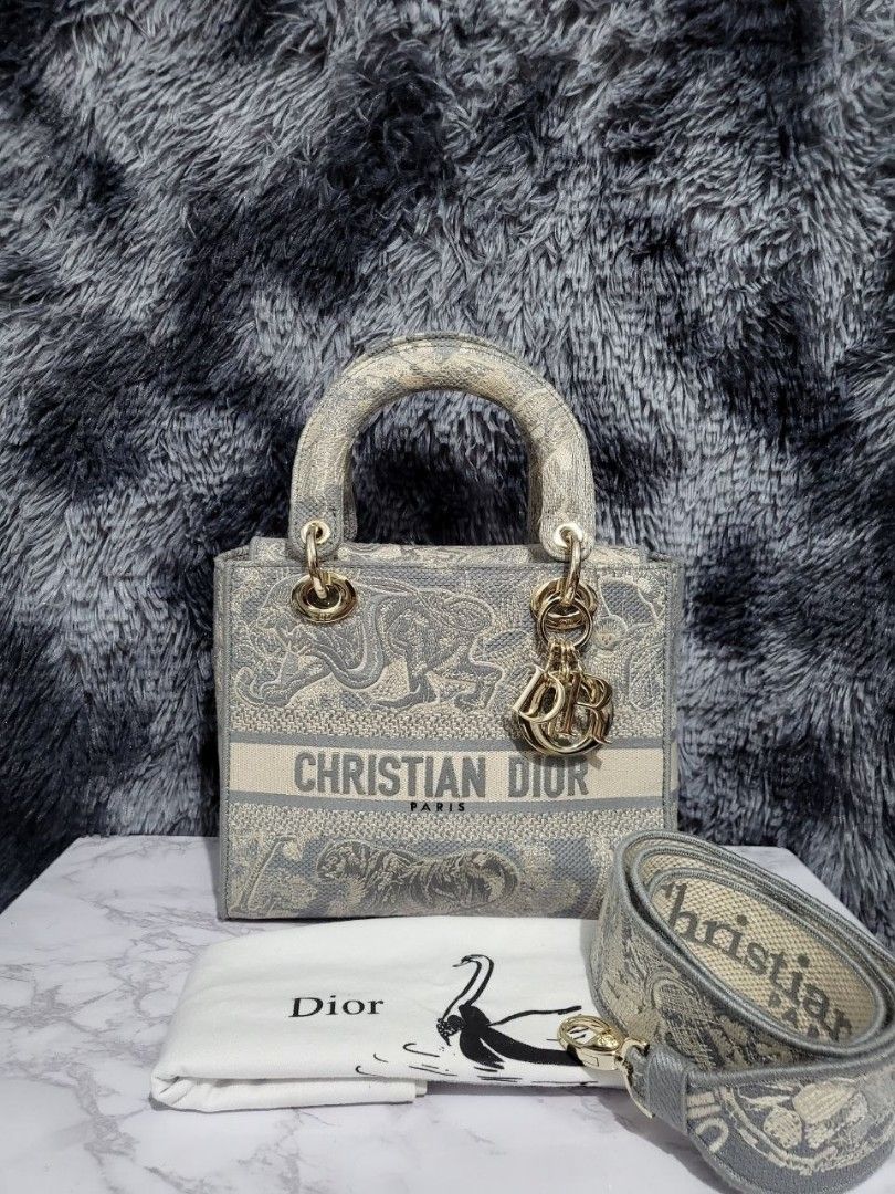LADY DIOR FROM JAPAN (Category: Luxury Bags & Wallets) located in Manila. Submitted by mrszregeng (Listing ID 1445402627, Image 1). Description: 💯 3D CANVAS EMBROIDERY 🇯🇵 JAPAN PRELOVED WITH DUSTBAG 8/10 CONDITION.