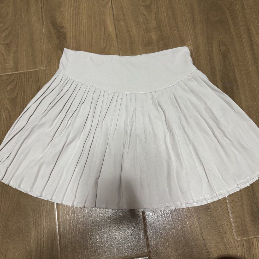 Light Gray Pleated Skirt with Shorts (Category: Skirts) located in Quezon City. Submitted by elysianpieces.ph (Listing ID 1445398081, Image 2). Description: ~ Light gray pleated skirt ~ Zipper on the side ~ Has safety shorts ~ Dimensions Waistline: Approx. 29in Length: Approx. 15in ~ Size L ~ Comes with freebies Kindly DM if interested or if you have any questions! MOP: GCash / PayMaya / BDO MOD: SDD / J&T / Gogo Express .