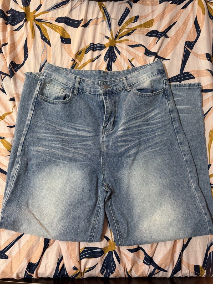 Light Wash Denim Jeans - High Waisted (Category: Jeans) located in Taytay. Submitted by cloudy_20 (Listing ID 1445371386, Image 1). Description: - Light wash denim jeans - High-waisted style - Distressed details on front and back - Button and zip closure - Two front pockets, two back pockets - Measurements available in photos - Perfect staple piece for any wardrobe - Size 32.