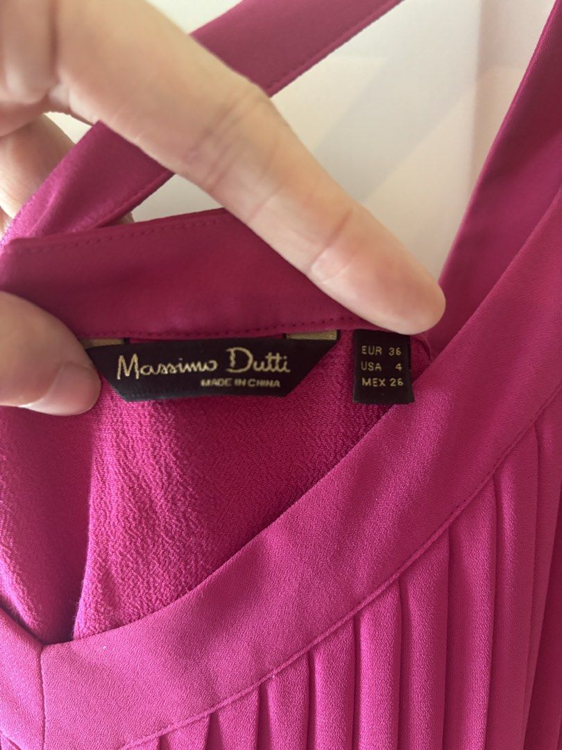 Massimo Dutti Pink Pleated Maxi Dress (Category: Dresses) located in Makati City. Submitted by geministyle (Listing ID 1445279430, Image 3). Description: - Brand: Massimo Dutti - Size: US 4 - Color: Pink - Design: All-over pleats - Back detail: Criss-cross straps - Length: Midi - Condition: Only worn a few times. In very good condition. - Original price: P5000+.