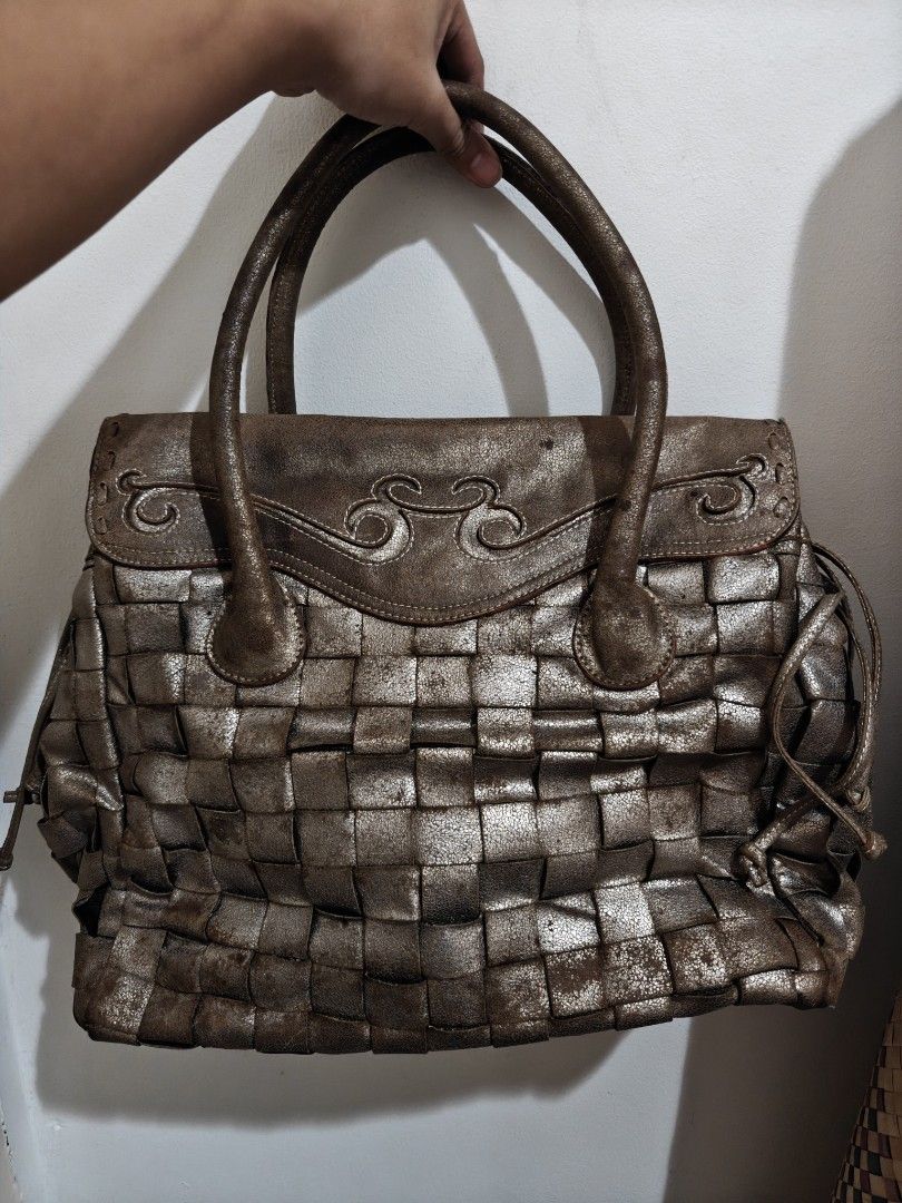 Metallic Woven Handbag with Decorative Top (Category: Tote Bags) located in Pasay City. Submitted by ryuthrifty (Listing ID 1445251905, Image 3). Description: - Cool metallic woven handbag - Unique textured design - Flap closure with button - Interior zippered pocket - Interior slip pocket - Sturdy handles - Great for adding flair to outfits.