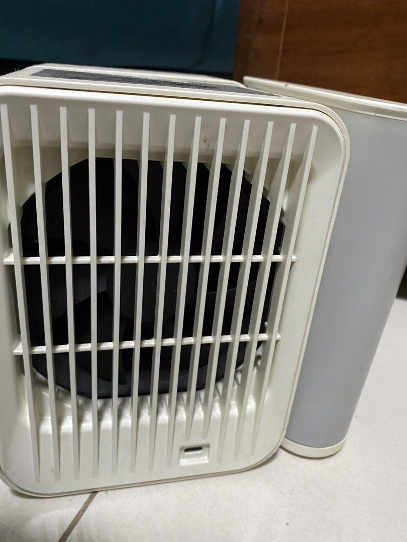 Microhoo Portable Air Cooler with Water Tank (Category: Air Conditioning and Heating) located in Quezon City. Submitted by waytodeclutter (Listing ID 1445370261, Image 3). Description: - Portable air cooler from Microhoo - Features a detachable water tank - Adjustable vents for customized airflow - Easy-to-use control knob - Convenient USB power port - Ideal for personal cooling solutions - In good working condition.