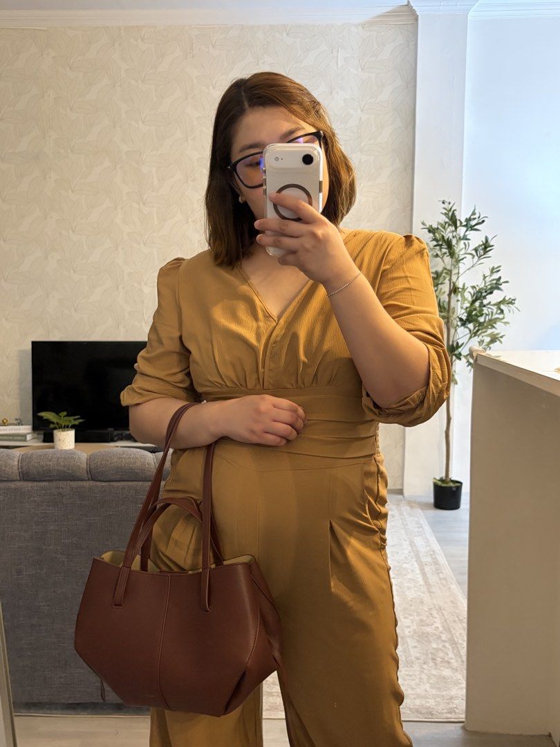 Mustard Yellow Puff Sleeve Jumpsuit (Category: Jumpsuits) located in Floridablanca. Submitted by ruthfsa (Listing ID 1445369367, Image 1). Description: Mustard Yellow Puff Sleeve Jumpsuit - Best fit womens Large to XL - Brand new with ziplock pouch - Mustard yellow jumpsuit - Features stylish puff sleeves - Flattering V-neckline - Cinched waist for a defined silhouette - Subtle textured fabric adds a unique touch - Comfortable and chic for any ev