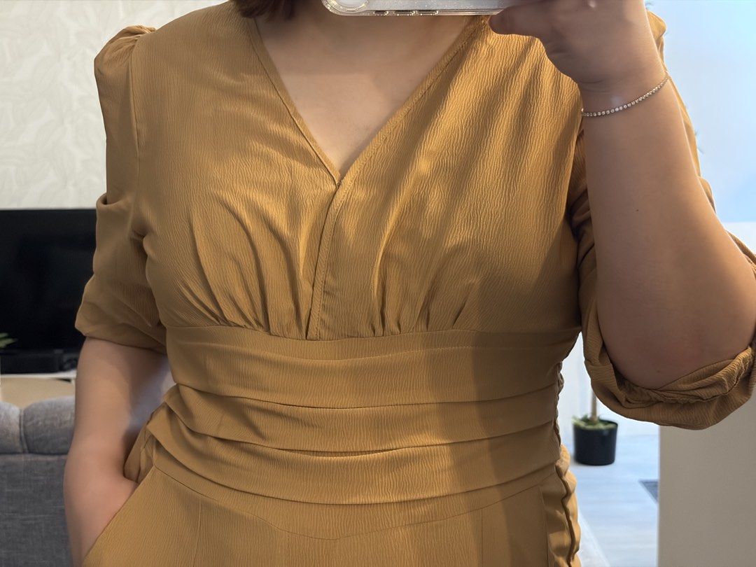 Mustard Yellow Puff Sleeve Jumpsuit (Category: Jumpsuits) located in Floridablanca. Submitted by ruthfsa (Listing ID 1445369367, Image 2). Description: Mustard Yellow Puff Sleeve Jumpsuit - Best fit womens Large to XL - Brand new with ziplock pouch - Mustard yellow jumpsuit - Features stylish puff sleeves - Flattering V-neckline - Cinched waist for a defined silhouette - Subtle textured fabric adds a unique touch - Comfortable and chic for any ev
