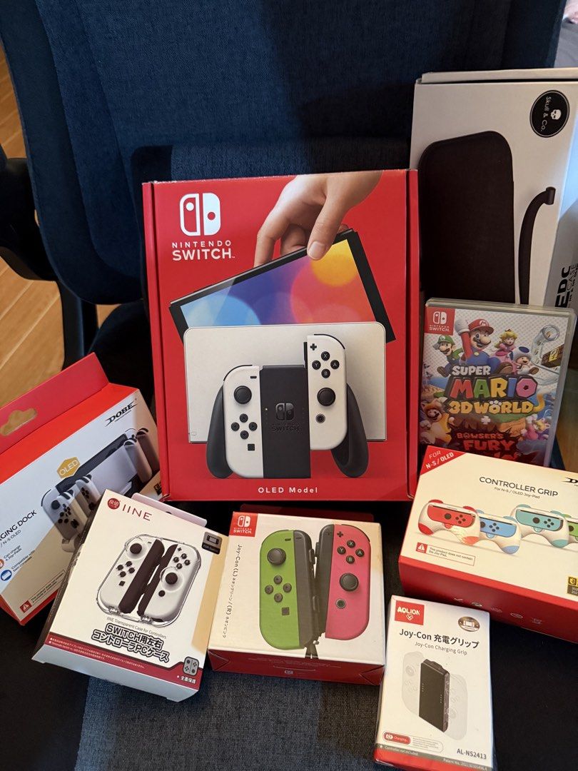 Nintendo Switch OLED Model Bundle with Games & Accessories (Category: Nintendo) located in Valenzuela. Submitted by d3clut (Listing ID 1445301727, Image 1). Description: 🎮 Nintendo Switch OLED – White + Complete Premium Bundle! 💎 ✨ Condition: Seldom used, like new, very well taken care of. 🕹 Included in the bundle: Nintendo Switch OLED – White Super Mario 3D World + Bowser’s Fury (game cartridge) Original dock, HDMI cable, power cable, box Joy