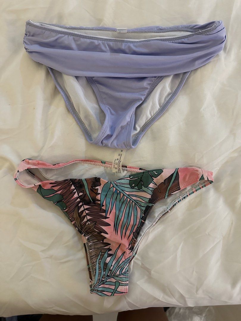 ONSTYLE Bikini Bottoms - Lavender & Tropical Print (Category: Bikinis & Swimsuits) located in Quezon City. Submitted by talamnl (Listing ID 1445397352, Image 2). Description: - Two bikini bottoms, size Medium. - One lavender with ruched waistband. - One vibrant tropical print with palm leaves and pink accents. - washed but never used .