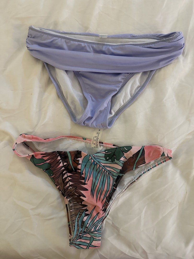 ONSTYLE Bikini Bottoms - Lavender & Tropical Print (Category: Bikinis & Swimsuits) located in Quezon City. Submitted by talamnl (Listing ID 1445397352, Image 1). Description: - Two bikini bottoms, size Medium. - One lavender with ruched waistband. - One vibrant tropical print with palm leaves and pink accents. - washed but never used .