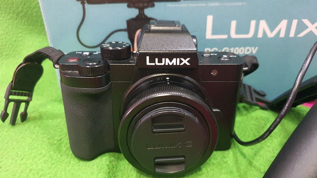Panasonic Lumix DC-G100DV Mirrorless Camera with Tripod (Category: Cameras) located in Quezon City. Submitted by maoisky (Listing ID 1445294695, Image 1). Description: - Panasonic Lumix DC-G100DV Camera - Ideal for Vlogging & Photography - Includes Original Box - Comes with Mini Tripod - Includes Charger - Screen displays menu settings - Ready for your creative projects.