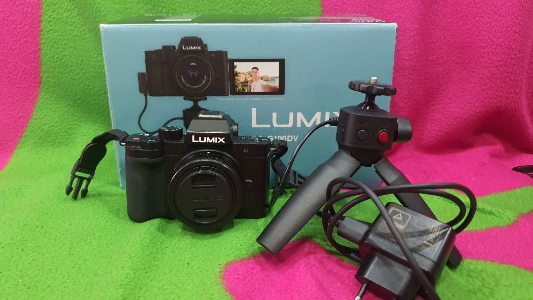 Panasonic Lumix DC-G100DV Mirrorless Camera with Tripod (Category: Cameras) located in Quezon City. Submitted by maoisky (Listing ID 1445294695, Image 2). Description: - Panasonic Lumix DC-G100DV Camera - Ideal for Vlogging & Photography - Includes Original Box - Comes with Mini Tripod - Includes Charger - Screen displays menu settings - Ready for your creative projects.