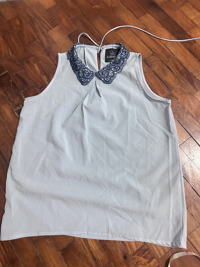 Plains & Prints Sleeveless Blouse with Lace Collar (Category: Blouses) located in Valenzuela. Submitted by cbgsales (Listing ID 1445260314, Image 1). Description: - Light blue sleeveless blouse - Brand: Plains & Prints - Features a pretty navy lace Peter Pan collar - Tie detail at the back of the neck - Simple and chic design - Perfect for dressing up or down.