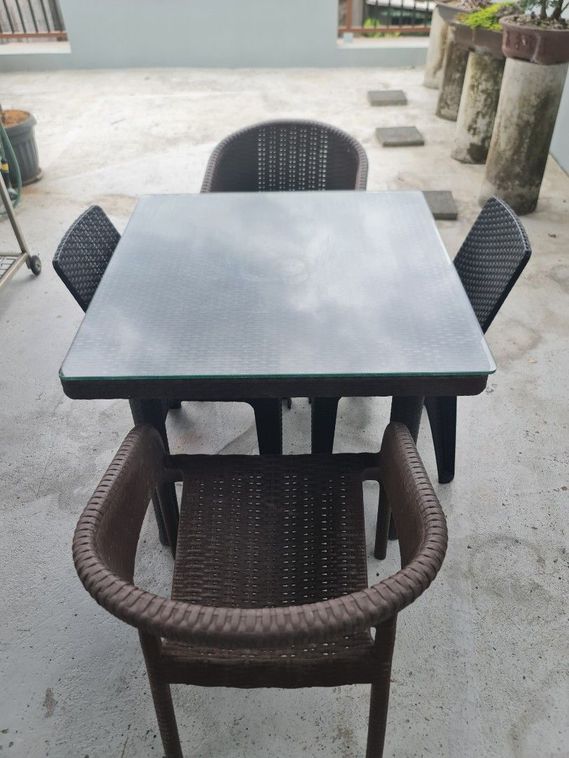 Plastic Rattan Table and Chairs (Category: Tables & Sets) located in Quezon City. Submitted by jt.pangan (Listing ID 1445263297, Image 1). Description: Fs: Plastic Rattan Table & Chairs 2 chairs 2 armchairs 1 table 35in x 35in ***GLASS NOT INCLUDED preloved to manage exprctation flaw: --faded part po s ibabaw as seen sa pics since nsa semi covered outdoor po cya --no cracks naman, matibay po cya loc: bagong pag-asa QC.