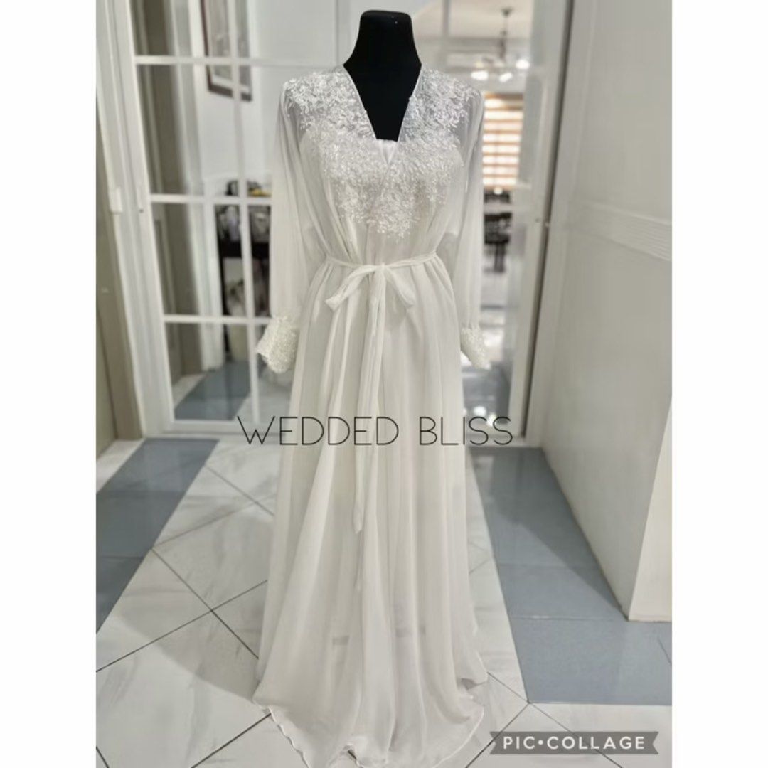 Plus Size Chiffon Wedding Robe (Category: Undergarments & Loungewear) located in Manila. Submitted by mrgfp (Listing ID 1445259968, Image 2). Description: - Beautiful white lace robe - Includes matching belt - Long sleeves with delicate lace cuffs - Perfect for bridal occasions or luxurious loungewear - Made from soft and flowy material - Available in multiple sizes (please refer to the size chart for your best fit).