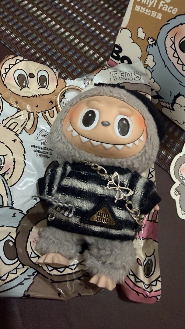 Pop Mart Labubu Sesame Bean with Box (Category: Designer & Blind Box Toys) located in Quezon City. Submitted by hukayshop (Listing ID 1445269403, Image 3). Description: Never been used. Got it from Pop Mart Taiwan. Pristine condition. With free cute Labubu clothes. .