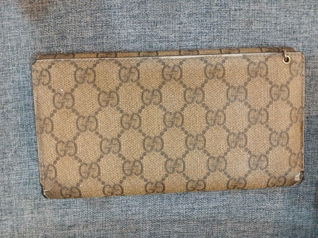 Porter, Louis Vuitton, Gucci Wallets Bundle (Category: Luxury Bags & Wallets) located in Manila. Submitted by bonifacioc73501 (Listing ID 1445329579, Image 3). Description: - Bundle of 3 pre-loved wallets - Includes: Porter zip-around, Louis Vuitton bifold, and Gucci long wallet - Gucci wallet features multiple card slots and a zip compartment - Ideal for those who enjoy variety or need multiple wallets.