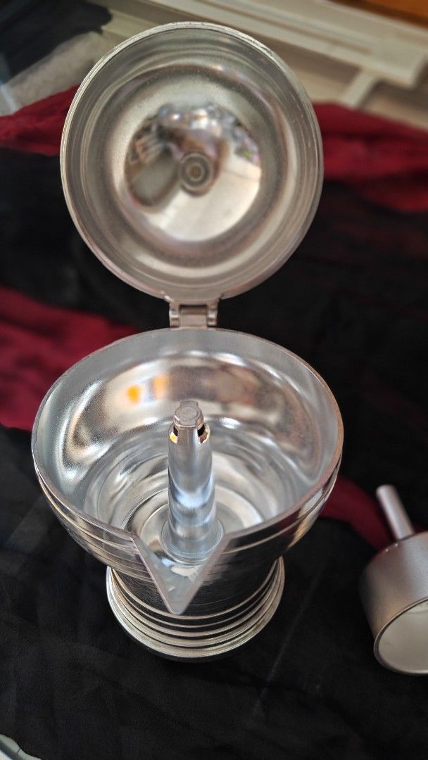 Alessi Pulcina Espresso coffee maker. Induction. (Category: Coffee Machines & Makers) located in Caloocan City. Submitted by finds_forkeeps (Listing ID 1445256722, Image 3). Description: alessi induction coffee maker Width (cm) 12.00 Height (cm) 26.00 Length (cm) 20.00 Capacity (cl) 30.00 Cups 6 A revolutionary moka that combines the technology developed by illycaffè and the design experience of Alessi. Designed by Michele de Lucchi, Pulcina enca