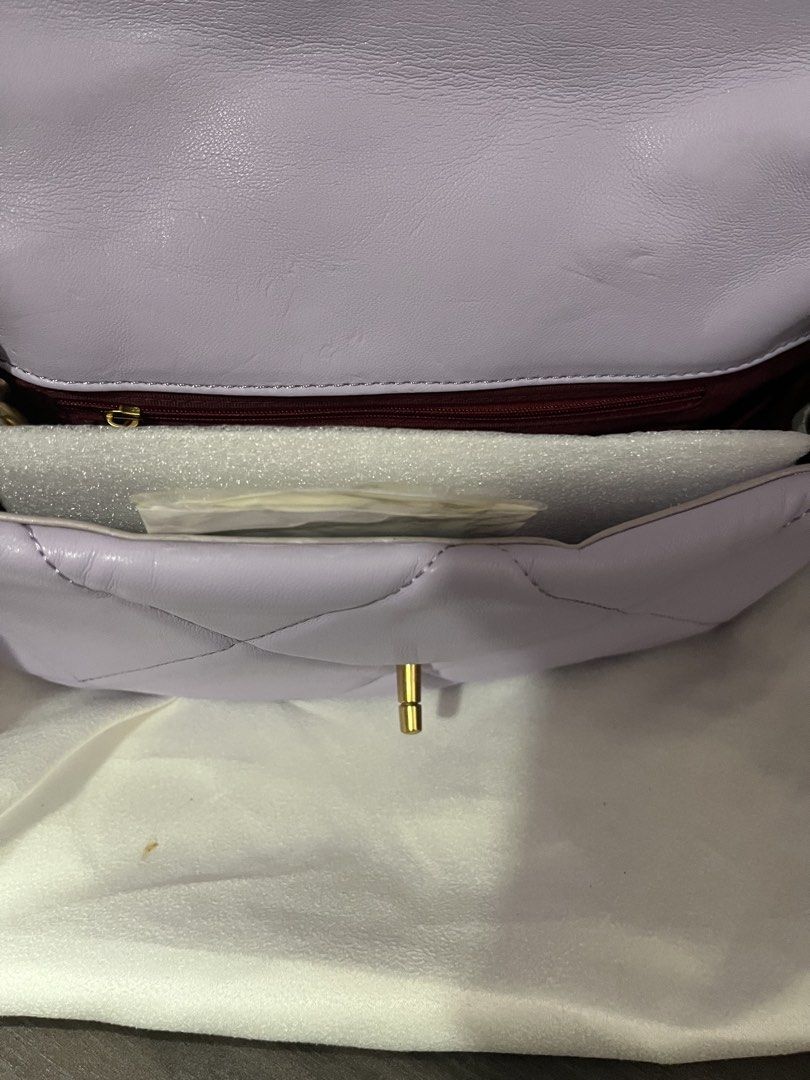 Purple Quilted Leather Chain Shoulder Bag (Category: Shoulder Bags) located in Pasig City. Submitted by melaiski28 (Listing ID 1445311980, Image 3). Description: - Adorable purple shoulder bag - Quilted leather material - Chic gold chain strap - Secure twist lock closure - Interior zippered pocket for essentials - Comes with original dust bag - Ideal for going out and special occasions.